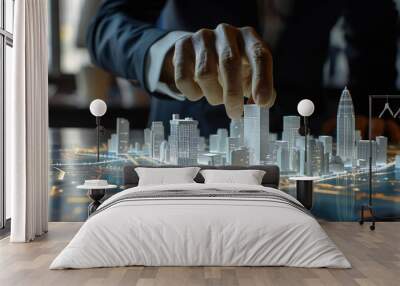 Businessman touching a virtual city model on a digital projection. Wall mural