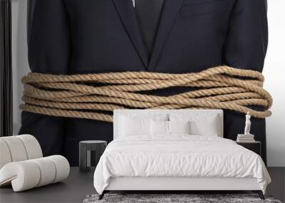 close up of businessman tied with the rope, isolated on white Wall mural