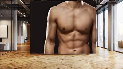 Close up of sexy male's torso, isolated on black Wall mural