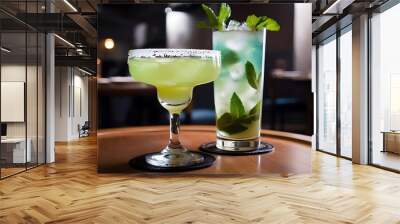 Close-up shot of margarita and mojito cocktails standing on table of restaurant Wall mural