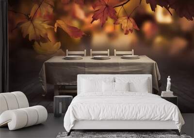 Empty wooden table with sackcloth over autumn leaves bokeh background Wall mural