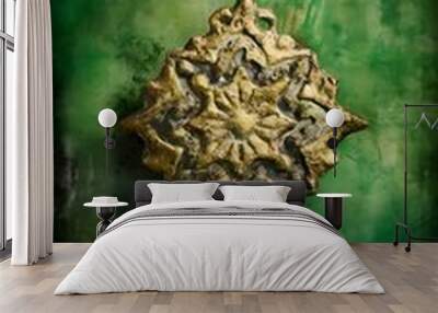 Grunge green background with ancient ornament Wall mural