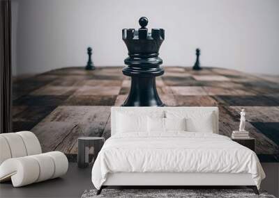 High angle view of black chess piece on wooden chessboard Wall mural