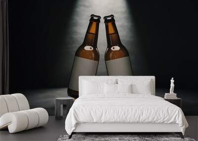 Low angle view of two glass bottles with beer and blank labels in row on dark background with back light Wall mural