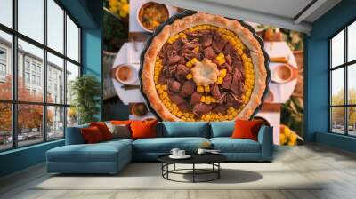 Pastel de choclo corn pie is a Chilean dish based on sweetcorn and beef closeup in the pots on the table. Horizontal top view from above Wall mural