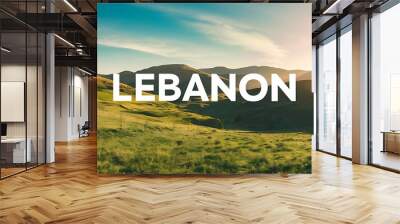 Photo of beautiful mountain landscape, natural background, blue sky with bright sun light, fresh air, green pasture valley in Lebanon mountains, scenic place, traveling and active vacation concept Wall mural