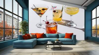 Three cocktails with alcohol margarita cocktail martini blue hawaian Iced tea with maraschino cherry isolated on a white background Wall mural