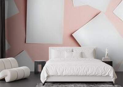 Top view of blank and empty sheets of paper on pink background with copy space Wall mural