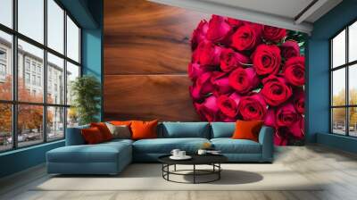 Top view of red roses on wooden table with copy space Wall mural