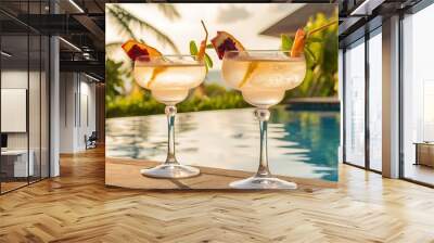 Two glasses with natural, delicious refreshing beverage at poolside Wall mural