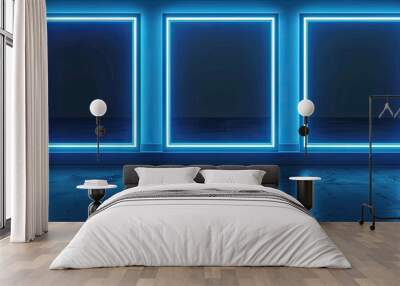 Three empty blue neon frames glowing on a wall in a dark empty room Wall mural