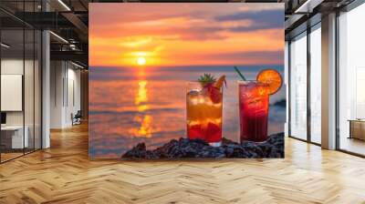 Two Tropical Cocktails on Rocks with a Sunset Over the Ocean Wall mural