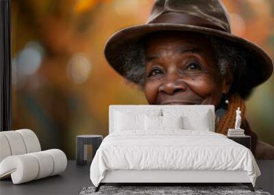 Wise black woman enjoying her retirement, beautiful older African-American woman in a casual setting 
 outdoors Wall mural