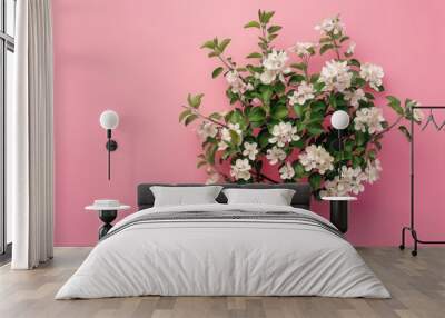 Creative layout with blooming apple tree on a pink background. Flat lay. Concept - spring minimalism. Wall mural