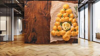 Bread buns Christmas tree with Roasted camembert cheese and rosemary on rustic background. Holiday recipes. Christmas menu. Christmas or Xmas pastries. Top view. Copy Space. Wall mural