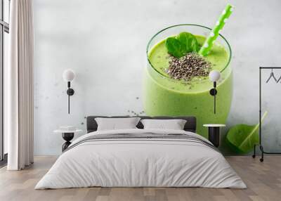 vegetarian healthy green smoothie from avocado, spinach leaves, apple and chia seeds on gray concret Wall mural