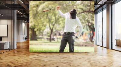 Asian men angry golfer trying to break his club Wall mural