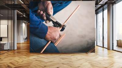 Industry system men worker cut joint with tool of copper pipe air conditioner Wall mural