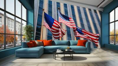 Big American flags waving in the wind of freedom on golden poles Wall mural