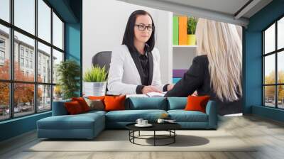 business woman evaluating job candidate Wall mural