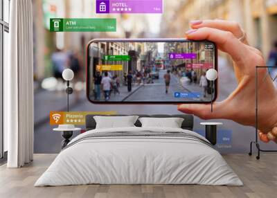 Concept of augmented reality technology being used in mobile phone for navigation and location based services Wall mural