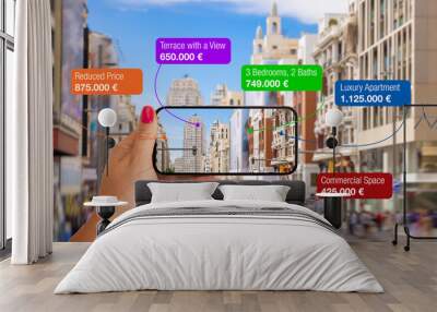 Concept of augmented reality technology being used in mobile phone in order to find different real estate properties for sale in city buildings. Wall mural