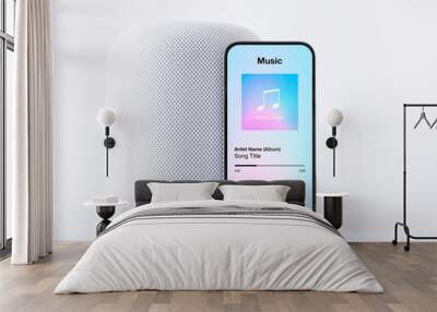 Sample music player app on mobile phone in front of wireless speaker on white background Wall mural