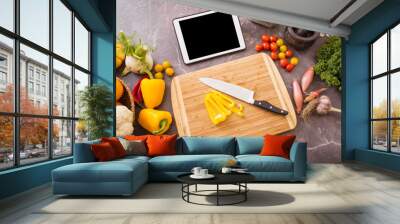 Tablet in kitchen for food recipe  Wall mural