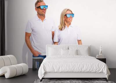 Woman and man wearing blank white polo shirts, mockup for polo shirt design Wall mural