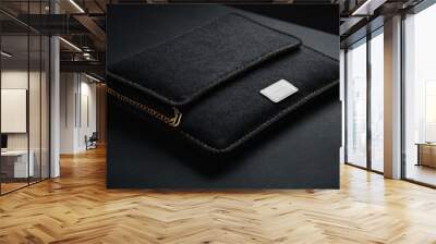 A modern felt laptop sleeve showcased on a black background for web banners Wall mural