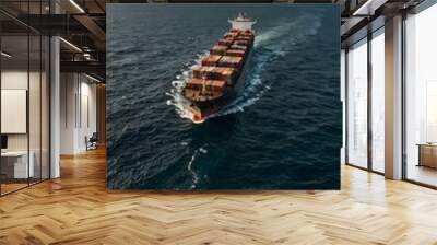 Cargo ship sailing on the ocean. Wall mural