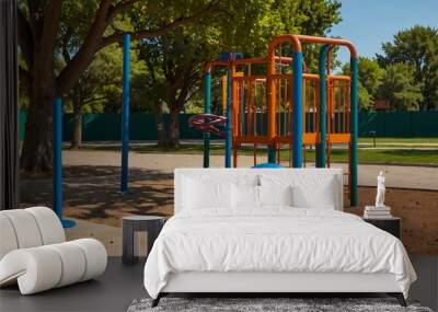 Colorful park with playground equipment and blank billboard. Wall mural