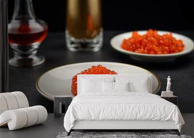 Luxurious red caviar with an elegant presentation. Wall mural