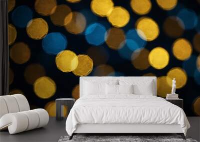 Yellow and blue bokeh lights against a dark background, creating a sense of wonder. Wall mural