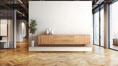 Interior mock up, contemporary style. Empty white wall in modern room. Copy space for your artwork, picture, poster. Apartment interior design. Wooden sideboard and indoor plant in pot. Wall mural