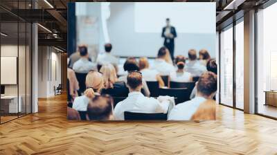 Business speaker giving a talk at business conference event. Wall mural