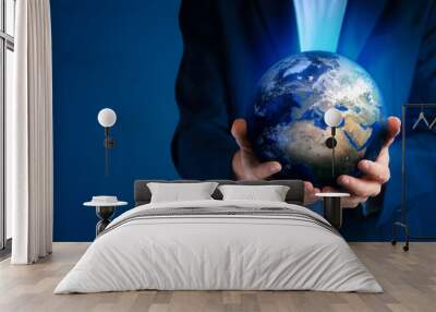 Earth day, Human hands holding blue earth, save earth concept. Wall mural