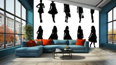 Set beautiful fashion girl silhouette on a white background Wall mural