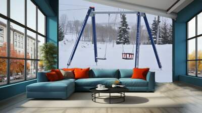 swing in snow Wall mural