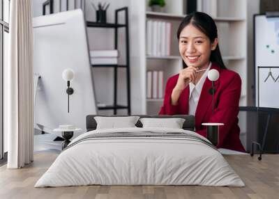 Businesswoman in suit thoughtful about accounting of new busines Wall mural