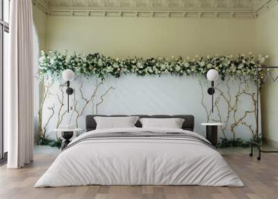 Indoor wedding light photozone decorated with fresh flowers Wall mural