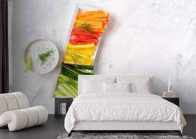 Colorful vegetable sticks with yogurt dip. Top view. Wall mural