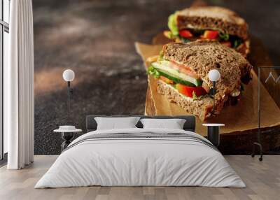 Prepared vegan sandwiches on dark rustic background Wall mural