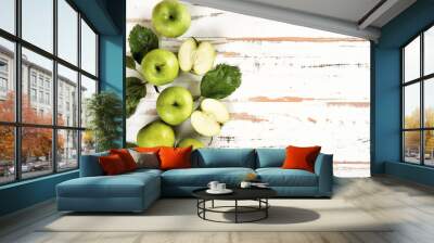 Top view of green apples on white background Wall mural