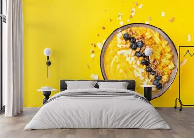 Top view of mango smoothie bowl with fruits Wall mural