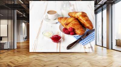 Two croissants and coffee for breakfast on white table Wall mural