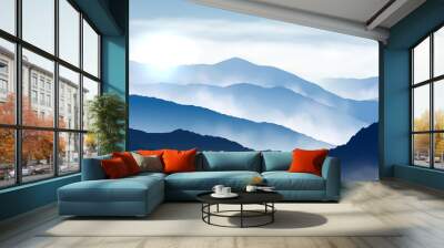 vector blue beautiful foggy mountains with sun and clouds in the sky Wall mural