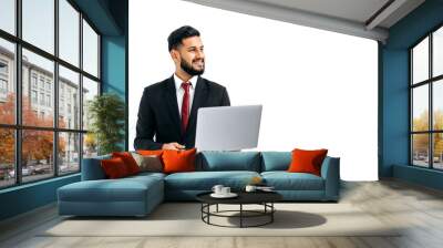 Elegant successful indian or arabian young man in business suit, male executive, holding open laptop in hands, looking aside, stands over isolated white background, smile friendly. Copy-space concept Wall mural