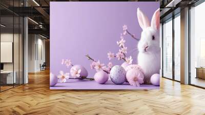 white rabbit with easter eggs and flowering branch on the purple background Wall mural