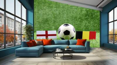 ball with England VS Belgium flag match on Green grass football 2018 Wall mural